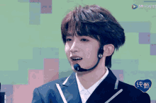 a man wearing a headset with chinese writing on the bottom
