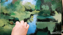 a person is painting a landscape with the words made in animotica below