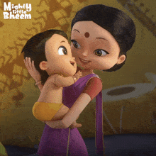 a cartoon of a woman holding a baby with the words mighty little bheem on the bottom right