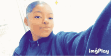 a girl is taking a selfie with the hashtag imgplay in the corner