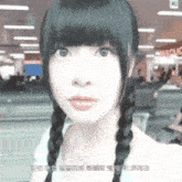 a close up of a girl 's face with a sign in the background that says ' missplace '