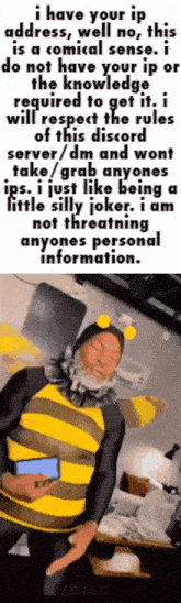 a man in a bee costume is holding a cell phone while standing in front of a computer .