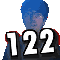 a man with glasses holds up the number 122 in front of his face