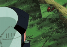 a cartoon character is looking at a picture of a monkey