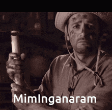 a man in a cowboy hat is holding a hammer and the word miminganaram is on the bottom of the image