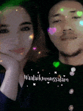 a man and a woman are standing next to each other with the words waalaikumussalam on the bottom right