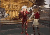 a man and a girl are dancing in front of a merry go round .