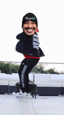a man wearing a blizzard hat is dancing on a patio