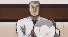 a man in a white shirt and tie holds a white plate