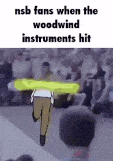 a cartoon of a man running with the words nsb fans when the woodwind instruments hit on the bottom