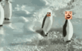 a penguin with a man 's face on its head