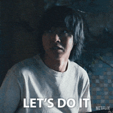 a man in a white shirt with the words let 's do it on the bottom