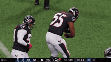the number 55 is on the back of a football player 's jersey