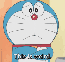 Doraemon This Is Weird GIF - Doraemon This Is Weird Strange GIFs