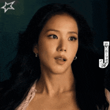 a close up of a woman 's face with a letter j in the corner