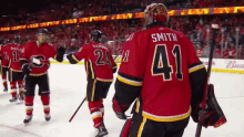 Hockey Calgary Flames GIF - Hockey Calgary Flames Hug GIFs