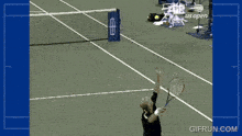 a tennis player is swinging a tennis racquet on a court with a us open sign behind him