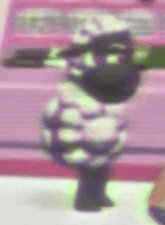 a blurred image of a cartoon character with a number 2 on his hat