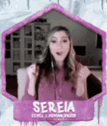 a picture of a woman in a purple shirt with the name sereia on it .