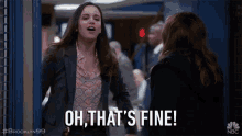 two women are standing next to each other and one of them is saying " oh that 's fine "