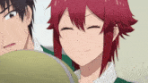 a girl with red hair is smiling next to a man with black hair
