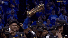 a group of basketball players wearing shirts that say nba champion