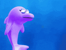 a purple dolphin is saying u are gay