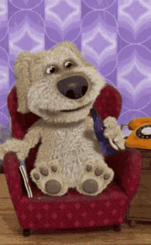 a stuffed animal is sitting in a chair talking on a telephone