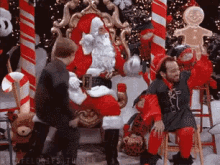 Kramer Santa GIF - Christmas Jump Ouch GIFs