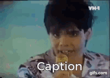 a woman is eating an ice cream cone with the caption caption written on the screen .
