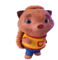 a stuffed animal wearing a yellow shirt with a heart on it is waving