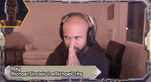 a man wearing headphones with the name michael sinclair ii on the bottom