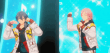 a couple of anime characters are dancing on a stage .