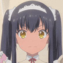 a close up of a girl with pigtails and a white headband