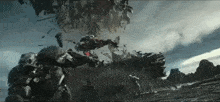 a group of soldiers are fighting each other in a battle scene