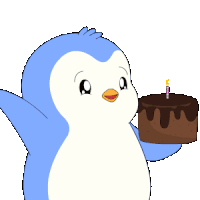 a blue and white penguin is blowing out a chocolate cake