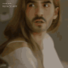 a man with long hair and a beard is shown in a reface app