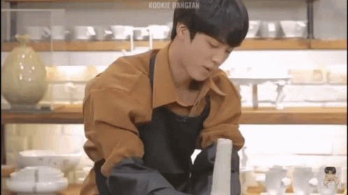 BTS's Jin making pottery