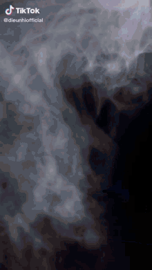 a tiktok video shows smoke coming out of a hole in the ground