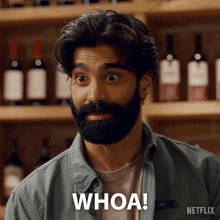 a man with a beard and a name tag that says joe says whoa