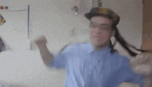 a blurry picture of a man wearing a hat that says ' n.y.c. ' on it