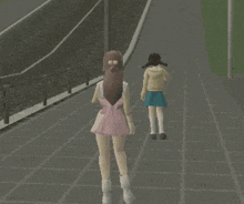 a girl in a pink dress is walking with another girl