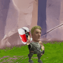 a man is holding a red and white shield