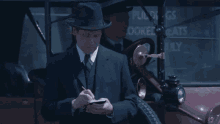 Ned Broy Notepad GIF - Ned Broy Notepad Michael Collins GIFs