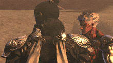 a man with a ponytail is standing next to another man with a beard