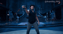 a man holding a bloody sword in front of a staircase with the hashtag @avantika_0902