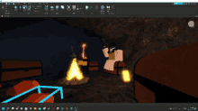 a computer screen shows a cave with a fire and treasures