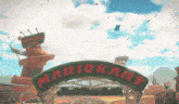 a sign that says mariokart on it in front of a building