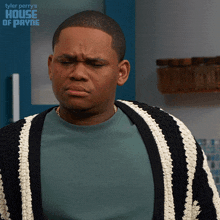 a man wearing a striped sweater is a character from tyler perry 's house of payne ..