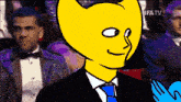 a cartoon of a man in a tuxedo with a yellow face and the word ifa tv behind him